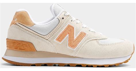 New Balance Ivory And Peach 574 Sneaker Women In Natural Lyst