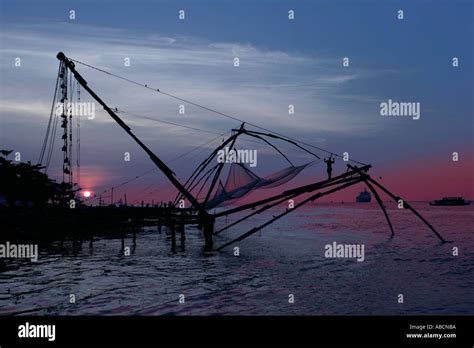 Chinese Fishing Nets At Sunset Kochi Kerala India Stock Photo - Alamy