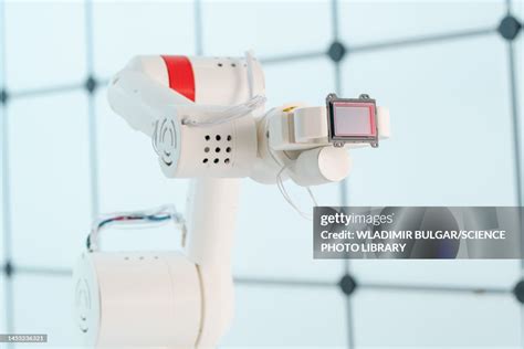 Robotic Arm Holding Sensor High-Res Stock Photo - Getty Images