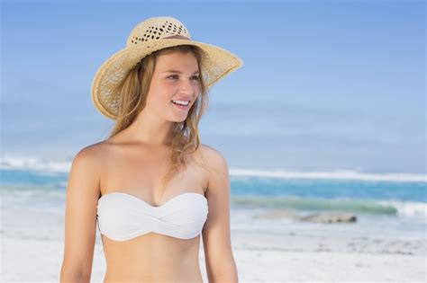 Premium Photo Beautiful Happy Blonde On The Beach In White Bikini And