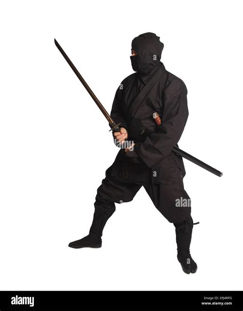 Asian Man Wearing Ninja Martial Arts Uniform Isolated On White