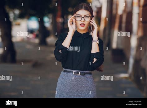 Beautiful Brunette With Glasses Stock Photo Alamy