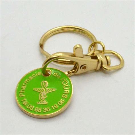 Promotional cheap custom logo key chains - Coin Holder Keychain