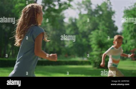 Brother sister playing catch in Stock Videos & Footage - HD and 4K