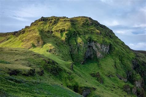 The Green Rocky Hill and a Rock Above Vik I Myrdal Village in Southern Iceland during Beautiful ...