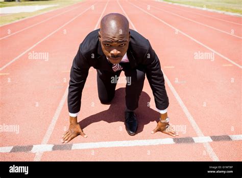 Businessman Ready To Run Stock Photo Alamy