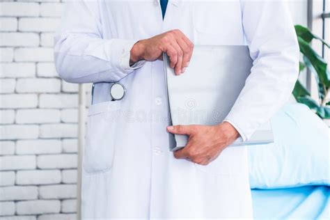 Doctor in Professional Uniform Working at Hospital Stock Photo - Image of looking, medicine ...