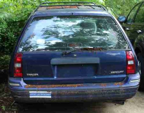 Mercury Tracer 1996, Wagon, It s blue with the gray interior, Purchased