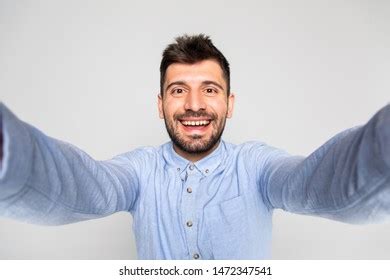 Close Up Portrait Of A Cheerful Bearded Man Taking Selfie Over 226