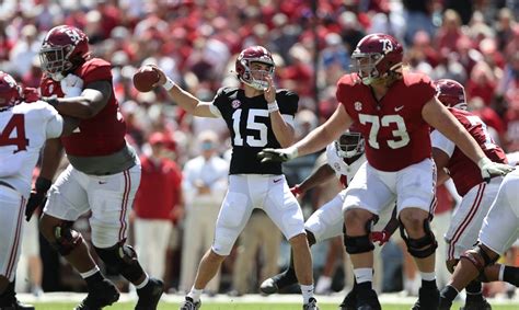 Alabama QB Ty Simpson getting work in with Crimson Tide gear on