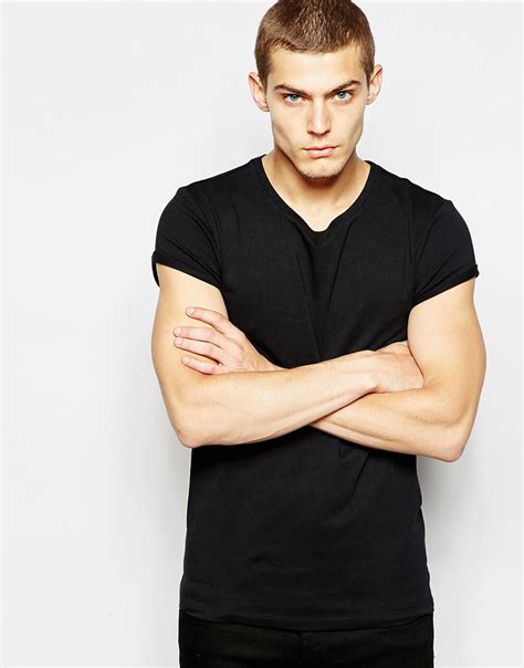 Lyst Asos Muscle Fit T Shirt With Roll Sleeves And Stretch In Black