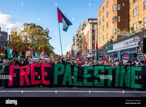 People March Through London With A 'Free Palestine' Banner Calling For ...