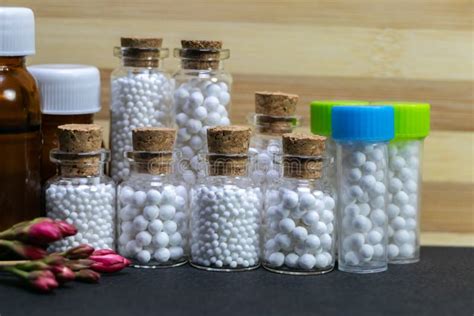 Homeopathic Medicine Bottles Consisting Of Pills And Liquid Substance