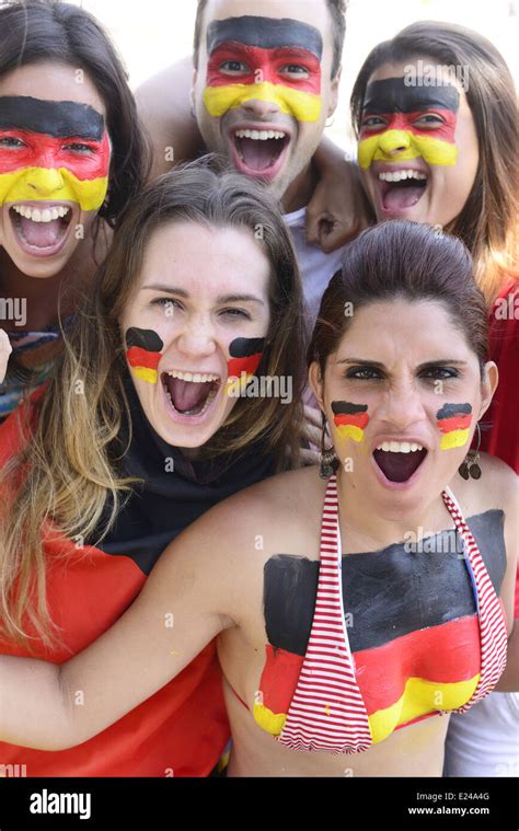 Group Of Happy German Soccer Fans Commemorating Victory Yelling Stock