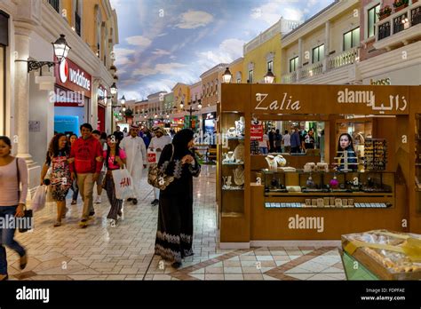 Colourful Shops At Villaggio Shopping Mall, Doha, Qatar Stock Photo - Alamy