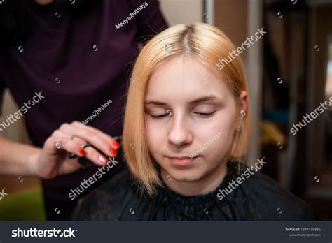 Beautiful Young Woman Gets Her Haircut Stock Photo 1844199886