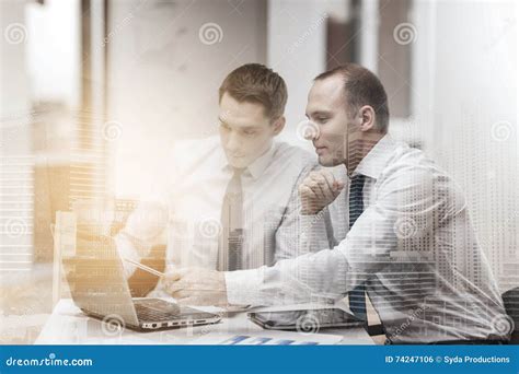 Two Businessmen Having Discussion In Office Stock Photo Image Of