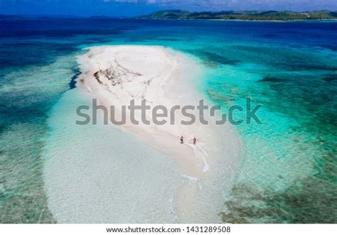 Naked Island View From The Sky Man Relaxing Taking Sunbath On The Beach Shot Taken With Drone