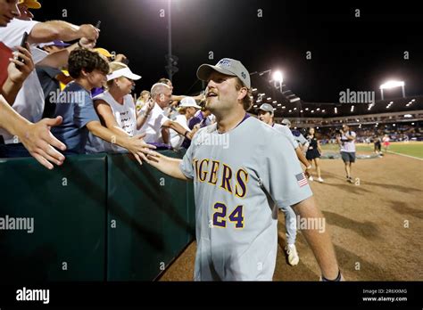 Lsu First Baseman Cade Beloso Celebrates With Fans After Their Team