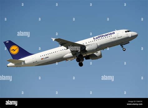 airplane Airbus A320-200 of german airline Lufthansa at take-off from ...