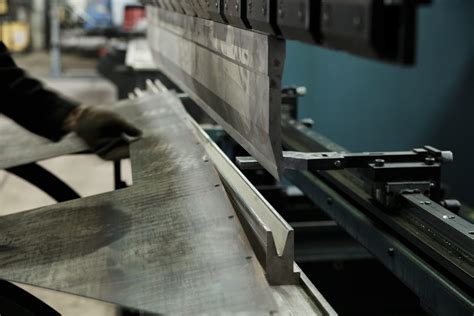 Operator Bending Metal Sheet By Sheet Bending Machine Fowler