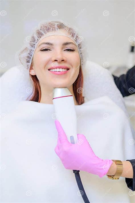 Portrait Of A Middle Aged Woman Receiving A Non Surgical Rejuvenation