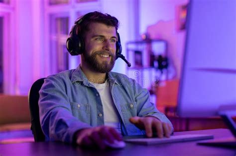 Bearded Man Using A Headset At The Computer Stock Image Image Of