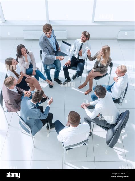 Young Employees Ask Questions During Business Training Stock Photo Alamy