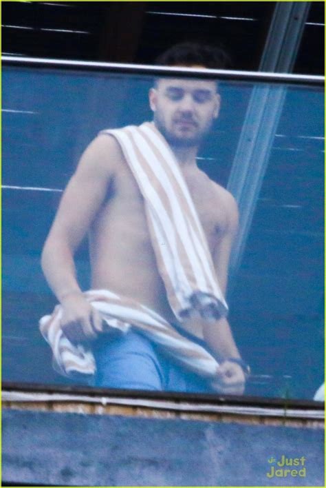 Shirtless Liam Payne Blows Kisses To Fans From Hotel Balcony Photo