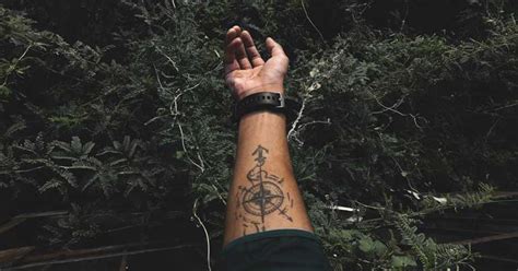 Unfolding the Compass Tattoo Meaning - Navigating the Depths of Symbolism