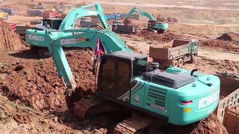 Amazing Power Digger Kobelco Excavator Loading Dirt Into Dump Trucks