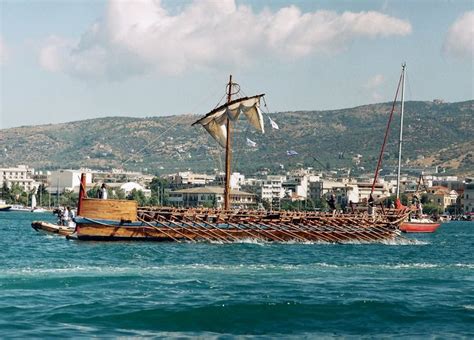 An Old Wooden Boat Sailing In The Ocean