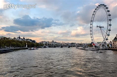 London Eye Millenium Wheel And Thames River At Sunset London Uk