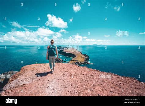 Description Athletic Woman Walks Along The São Lourenço View Point And