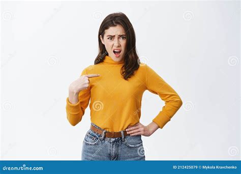 Insulted Shocked Young Woman Pointing At Herself And Gasping Being