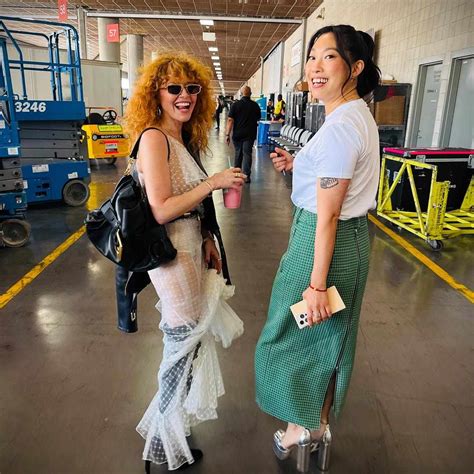 Natasha Lyonne Pairs A White Naked Dress With Thigh High Boots