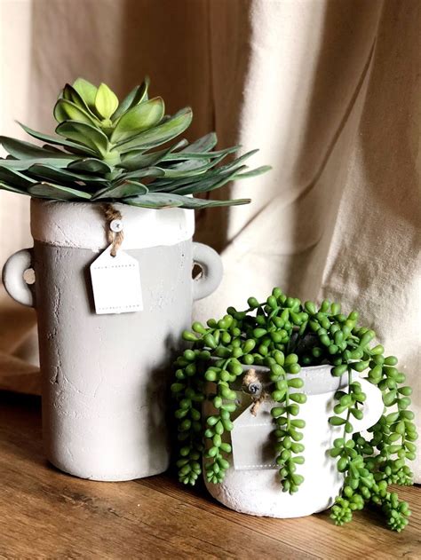 Succulents in concrete planters for the win!!! We love this look! Which ...