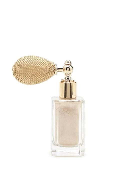 An Unscented Body Glitter Spray Featuring A Vintage Inspired Bottle