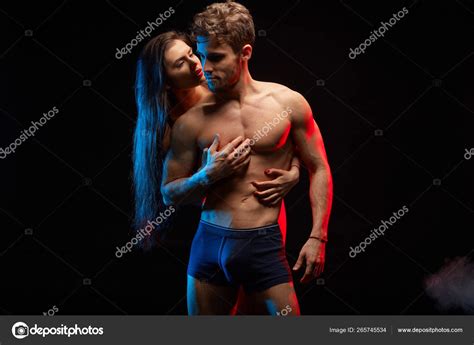 Seductive Woman In Lingerie And Man In Tender Embrace Stock Photo By Greyday