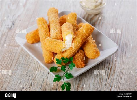 fried cheese sticks breaded Stock Photo - Alamy