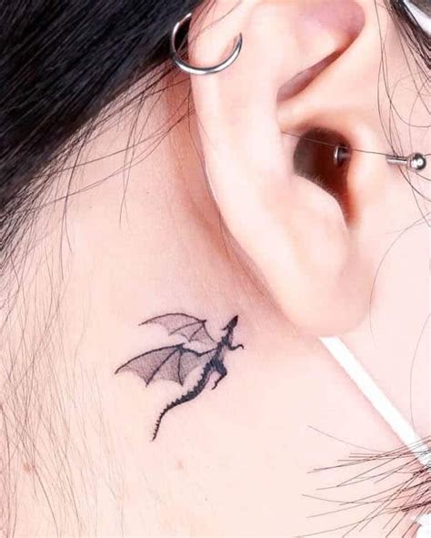 Minimalist Dragon Tattoo On The Ear In Dragon Tattoo Behind Ear