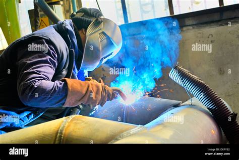 A Welder Working At Shipyard In Day Time Stock Photo Alamy