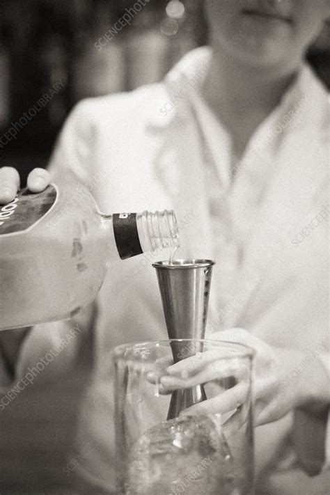 A Woman Mixing A Cocktail A Mixologist Stock Image F012 8471