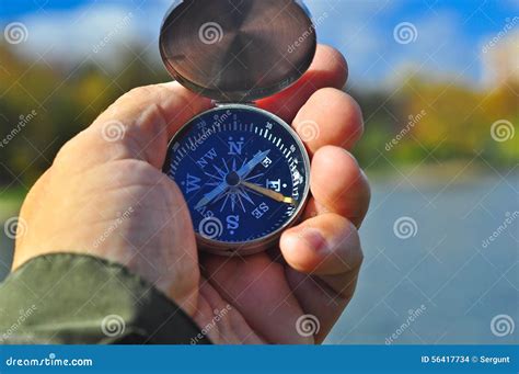 Compass In Hand Stock Photo Image Of East Direction 56417734