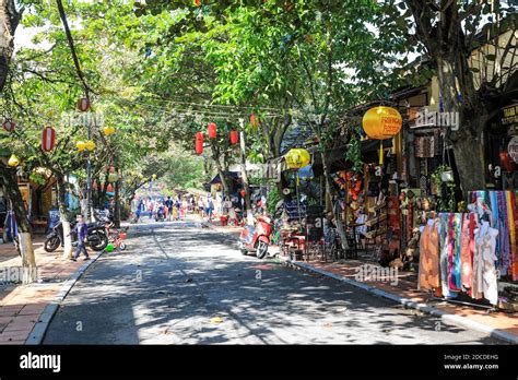 A colourful street scene at Nguyễn Thị Minh Khai street in the old ...