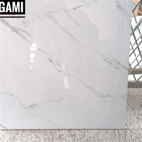 Jual GRANIT LANTAI 60X60 GLOSSY PUTIH MARMER ABU CARARA IKAD STATURIO