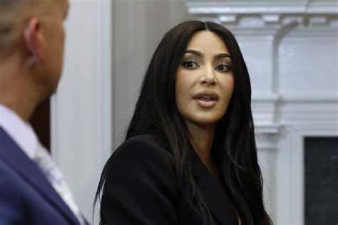 Kim Kardashian Debuts New Rooty Platinum Hair Style 12