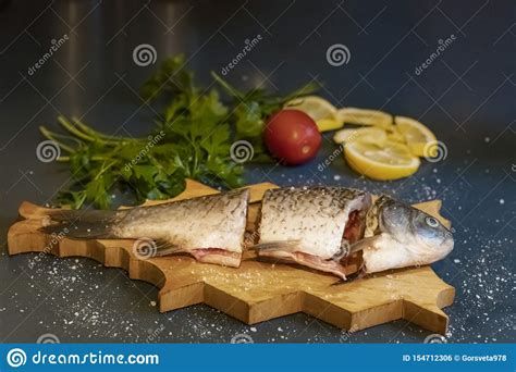 Pieces Of Fresh Fish On A Board Stock Photo Image Of Kitchen