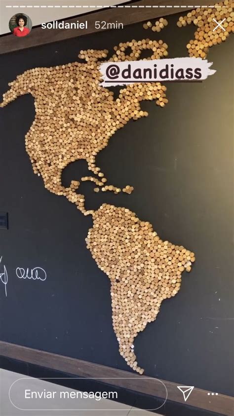 The World Map Made Out Of Nuts Is Shown On A Blackboard With White Writing