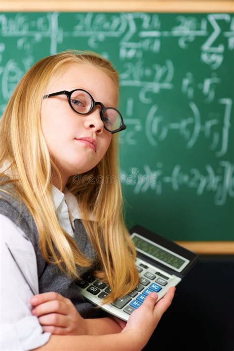 Shes Got All The Answers Portrait Of A Cute Blonde Girl Holding A Pen